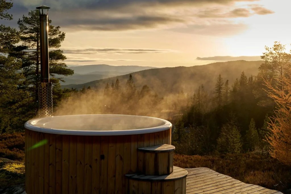 Wood-fired hot tub steaming in an outdoor garden