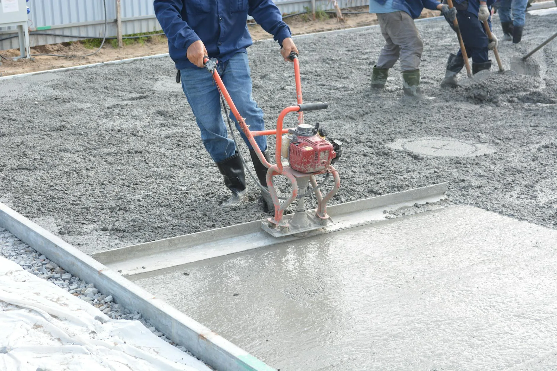 Concrete paving base being prepared in a garden