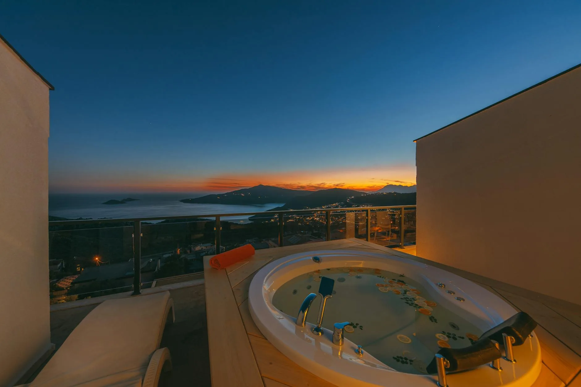 Hot tub steaming outdoors in the evening