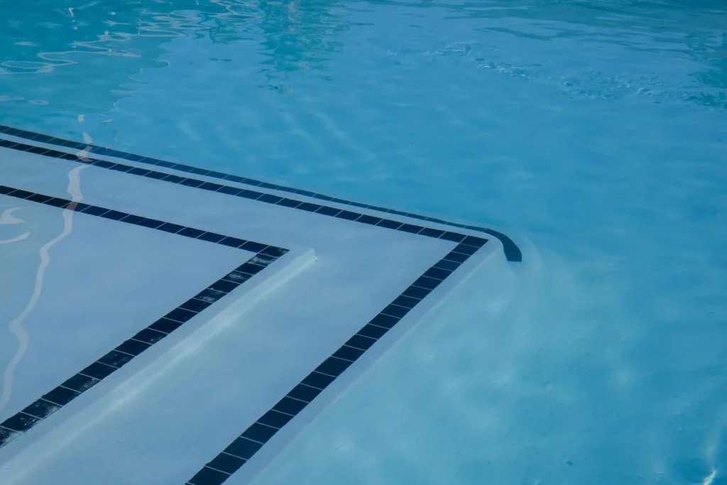 Clear blue water in an outdoor spa ready for summer
