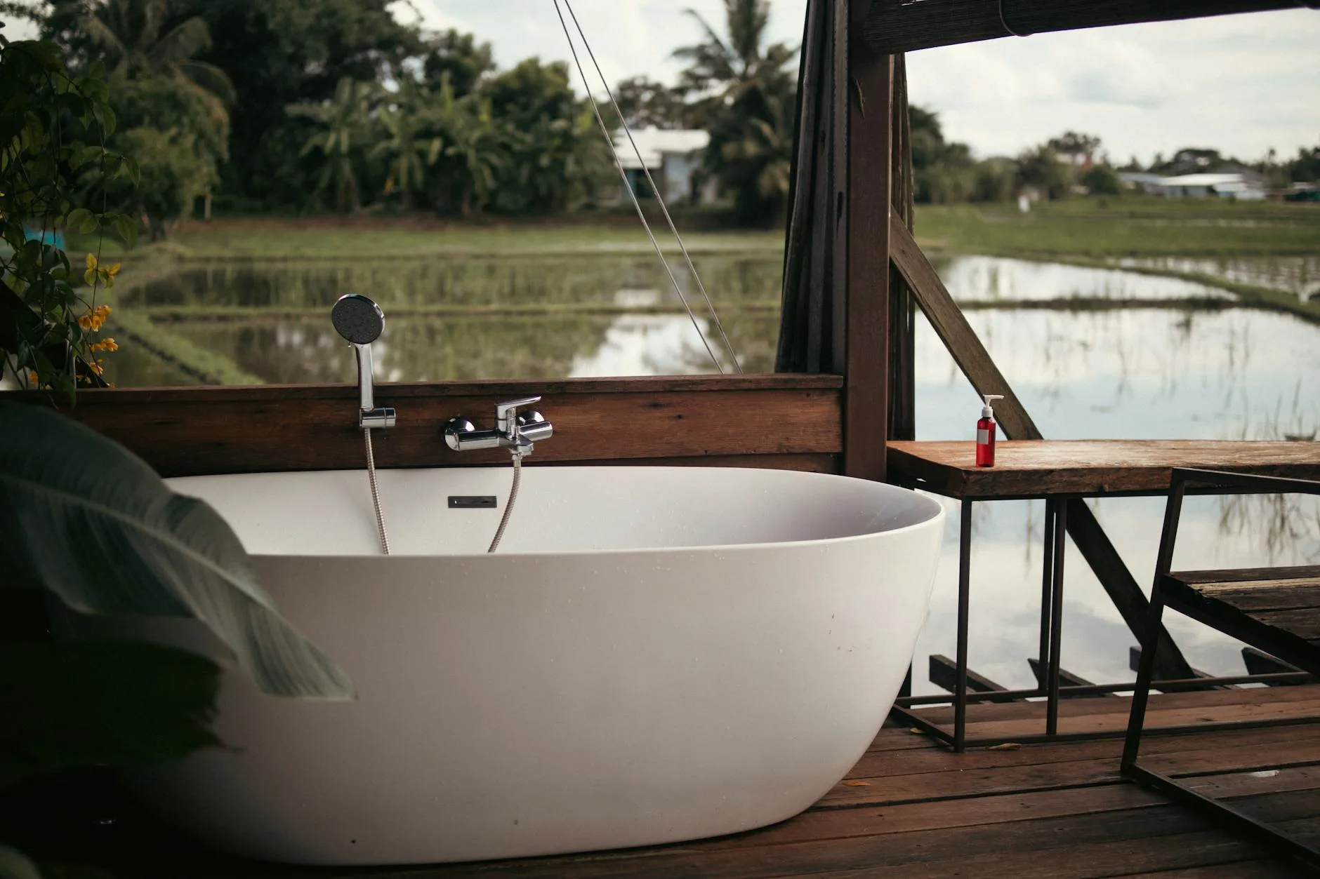Hot tub sitting on reinforced timber decking in a garden