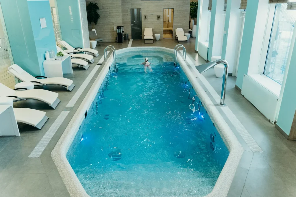 Modern swim spa installed in a landscaped garden