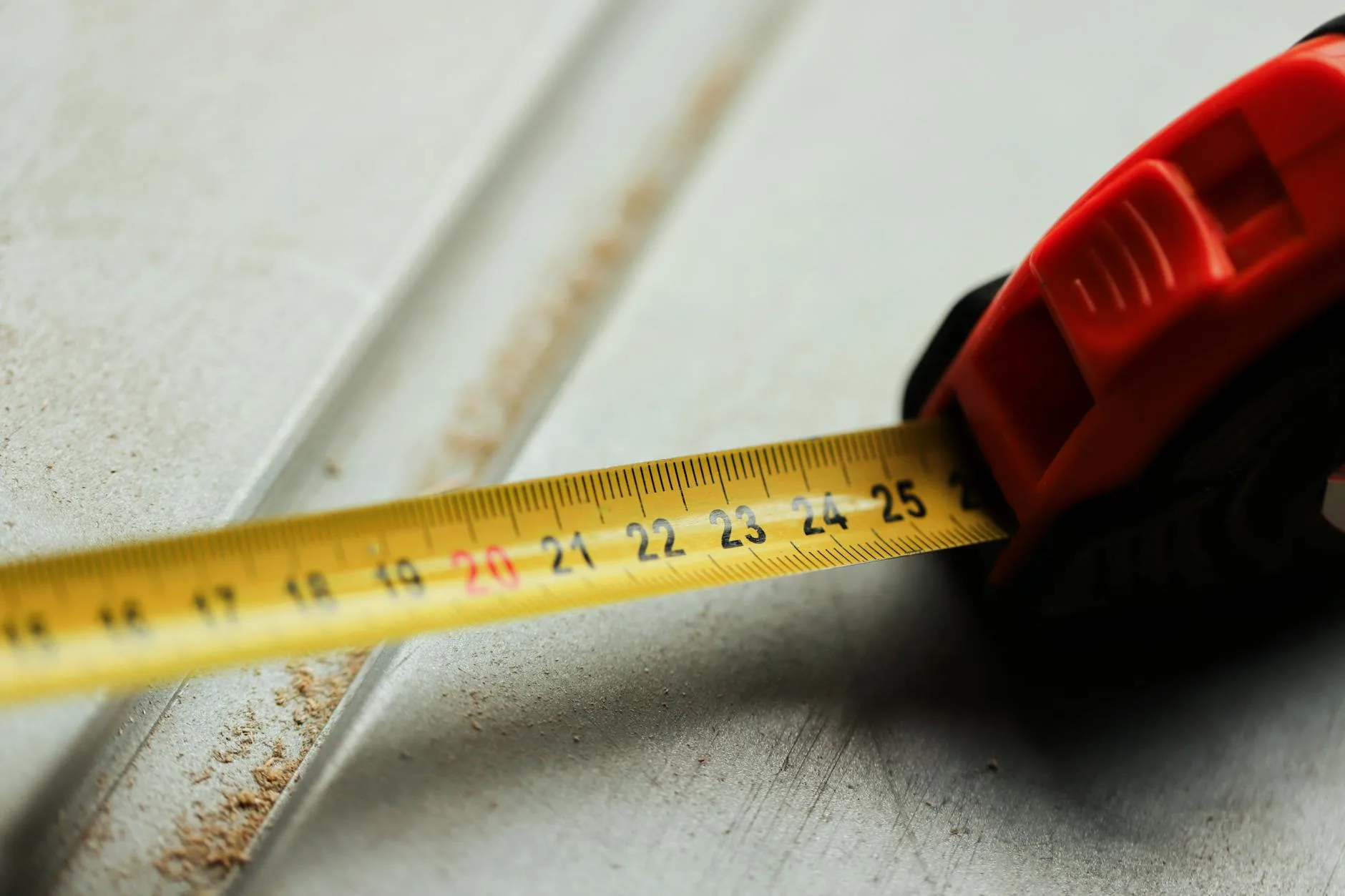 Tape measure on a garden patio for measuring space