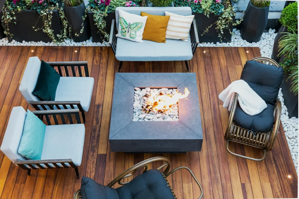 Garden patio with decking and evening lights for relaxation