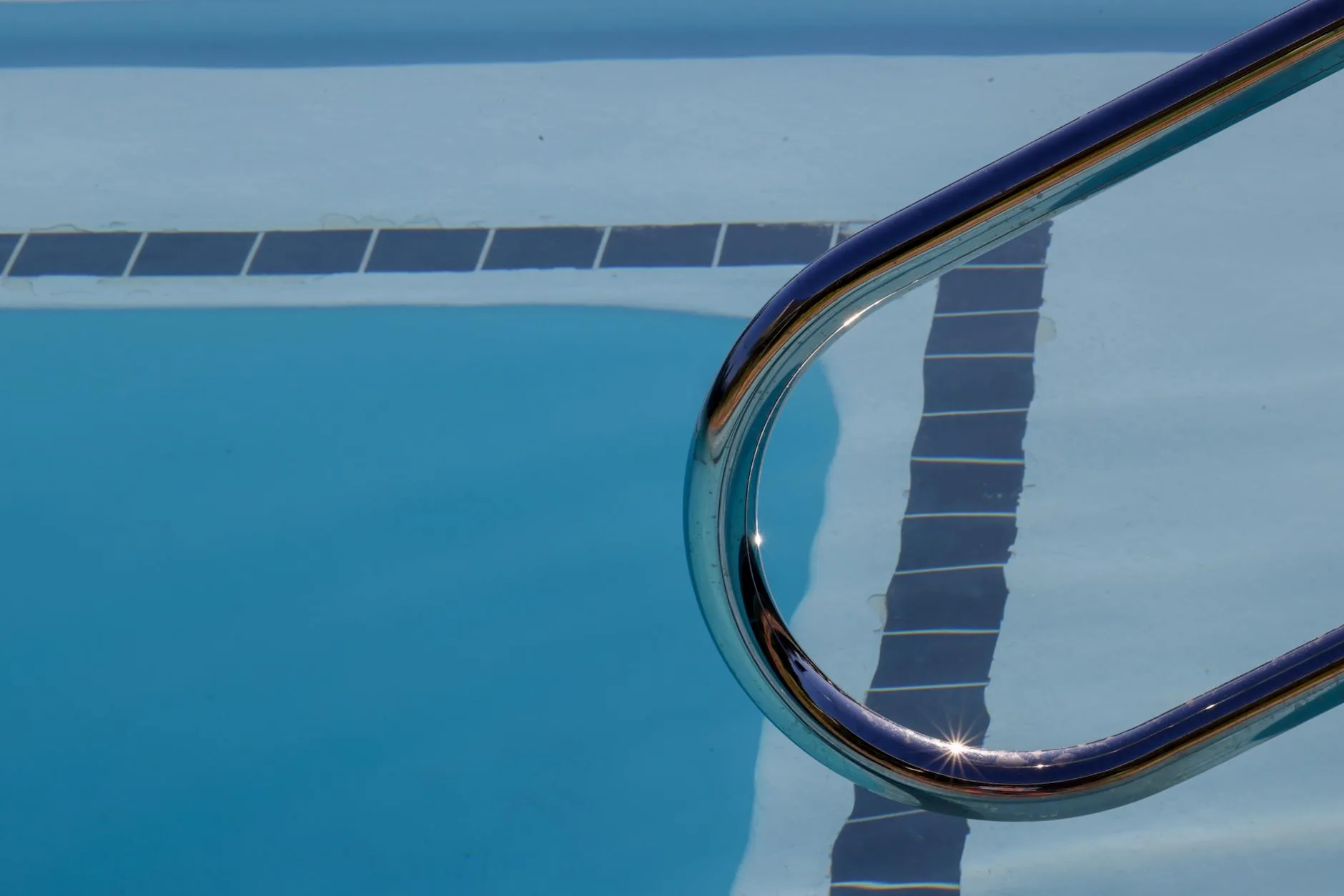 Thermometer measuring warm water temperature in a spa