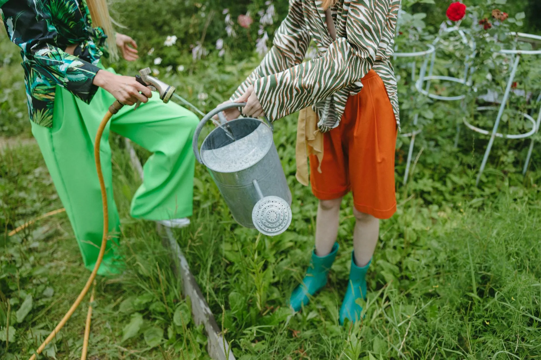 Garden hose filling a hot tub with fresh water