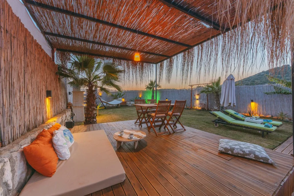 Hot tub on outdoor garden deck in evening