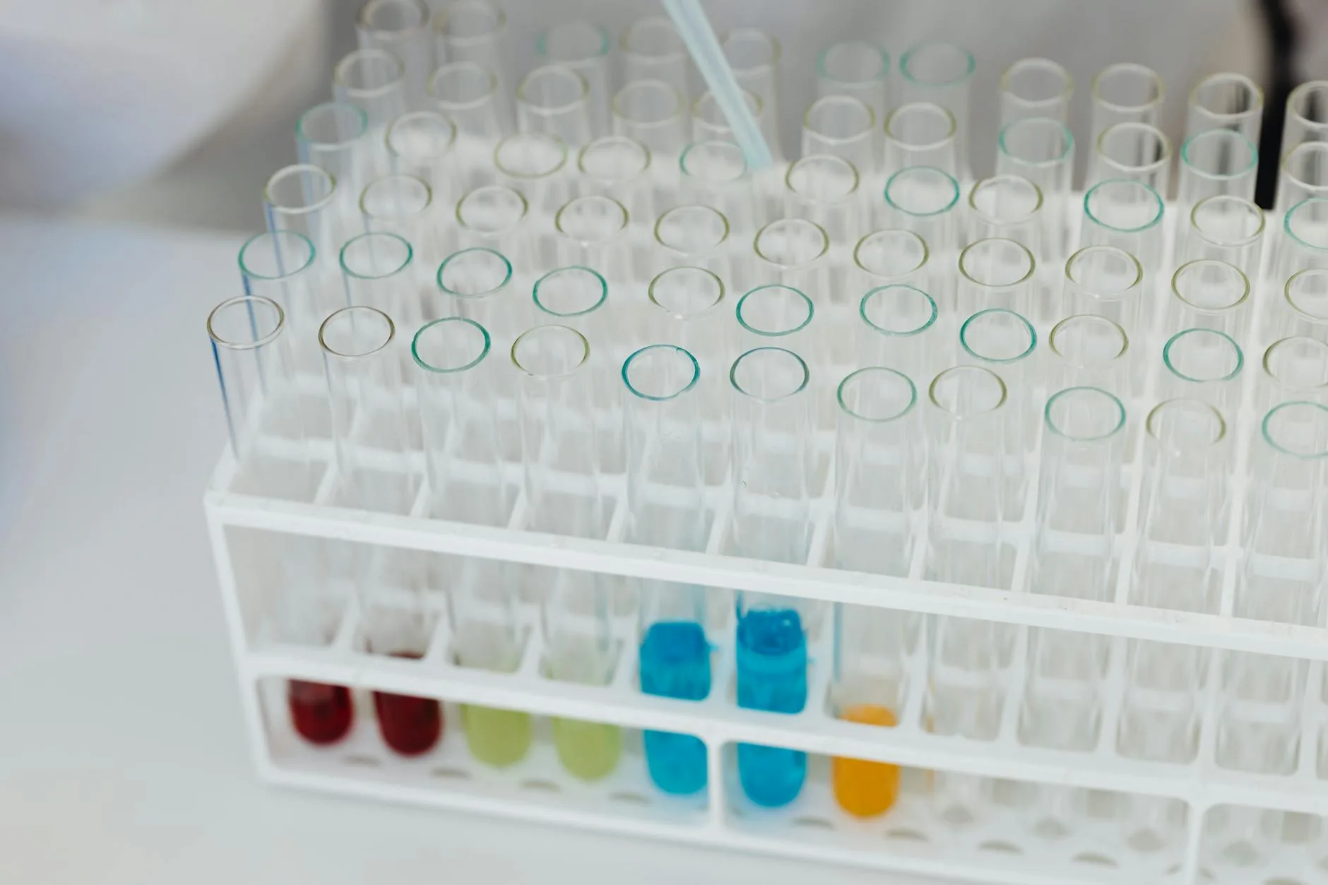 Water test strip being used to check hot tub chemistry