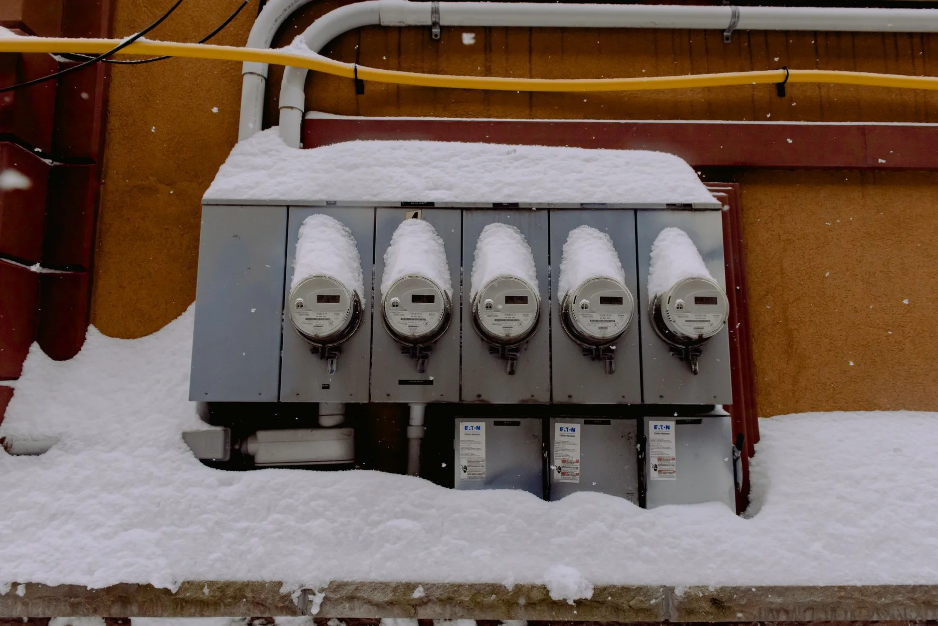 Electricity meter showing household energy use for hot tub costs